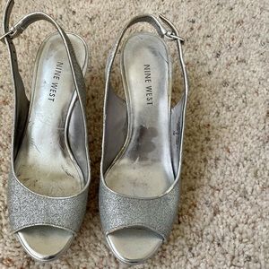 Nine West 2 1/2 inch strap pump. Worn once on my wedding day.